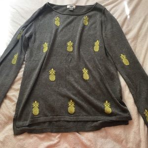 Gray and yellow pineapple sweater.